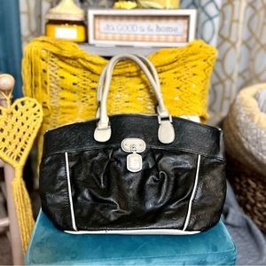 Guess brand black and tan handbag